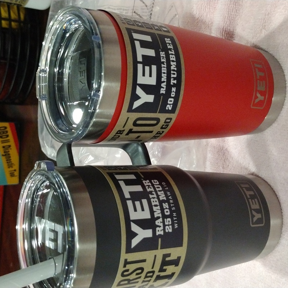 2 Yeti Cups, one Red and one Charcoal